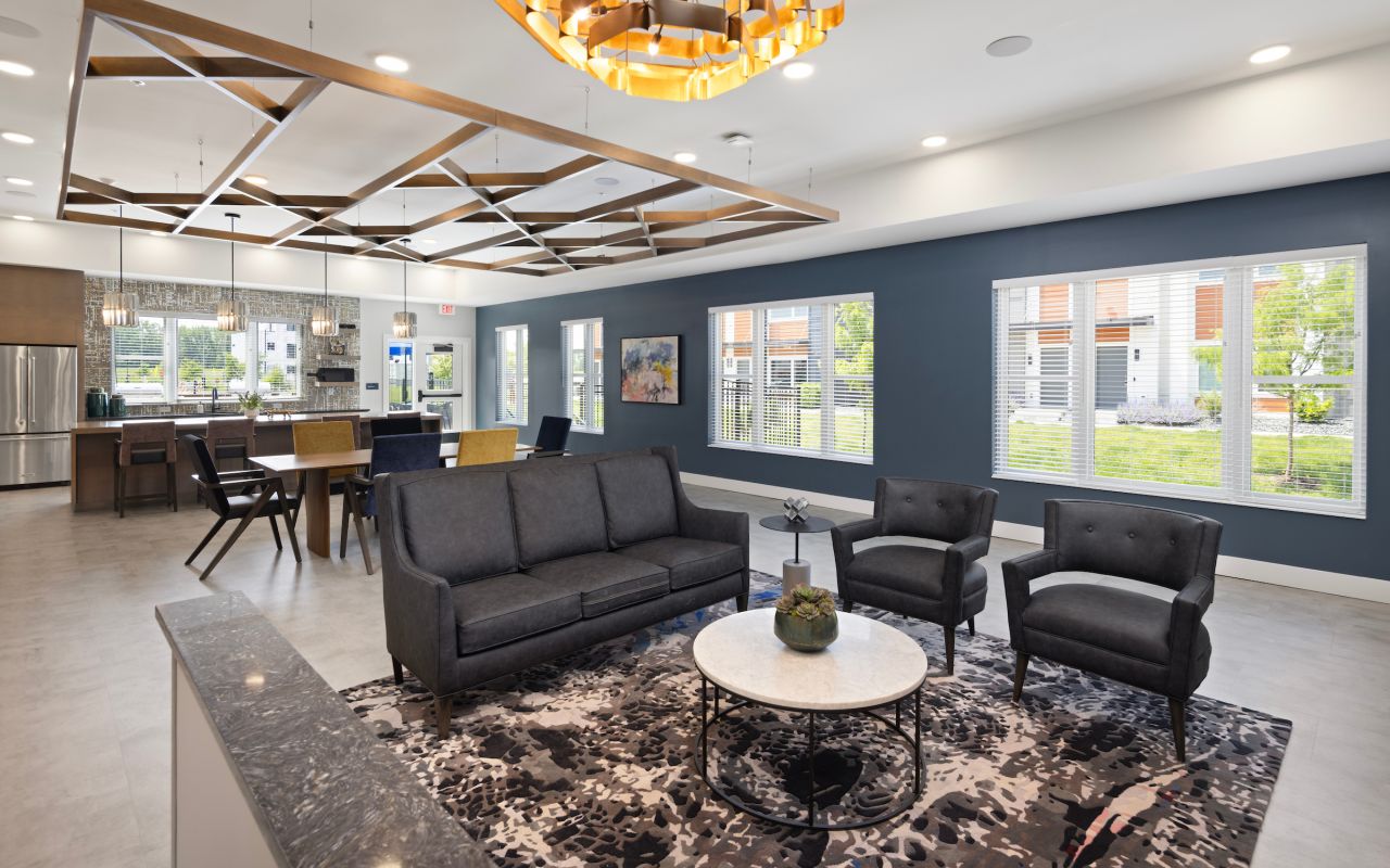 Slate apartments elegant resident clubhouse with modern furnishings.